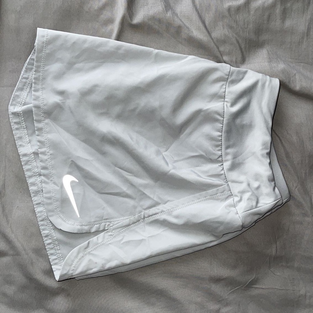 Nike Running Shorts. Never worn w/o tags. Perfect condition.